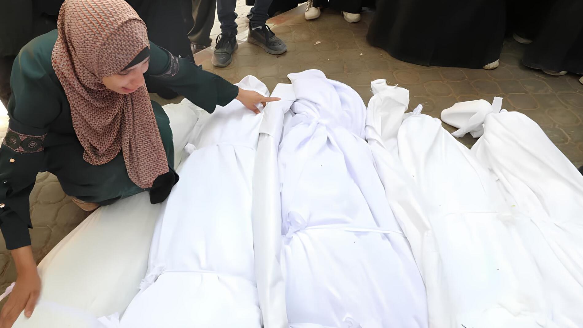 The body of a Palestinian martyr at Al-Shifa Hospital.